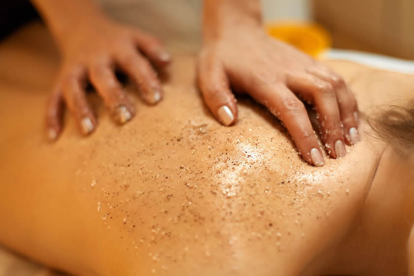 Massage therapy performed by professional therapist at Heed Spa